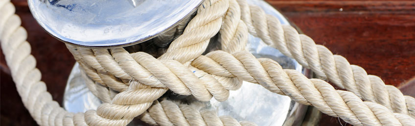 Close-up of a rope tied-up on a winch of a sailboat © lebanmax Shutterstock.com